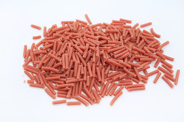 Red pasta isolated on white background.