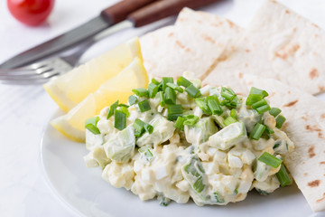 Egg salad with avocado, Mexican style breakfast
