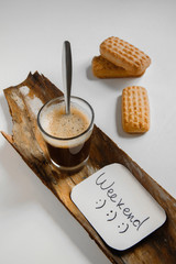Iced coffee and cookies on table, flat lay style for weekend/holiday refreshing mood