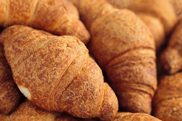 Background of fresh croissants.