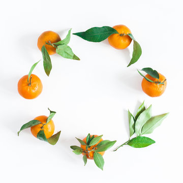 Mandarins on white background. Flat lay, top view, copy space, square