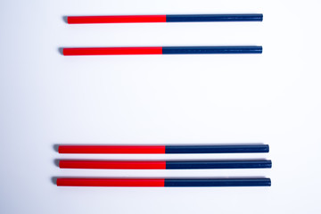 Two colored pencils, two sided, Red and blue pencils Isolated on white background