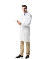 Doctor in glasses wearing white coat and using tablet isolated on white