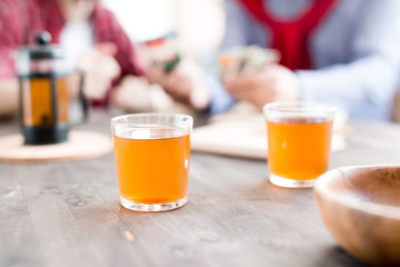 Close-up of two cups of tea standing on the table at office