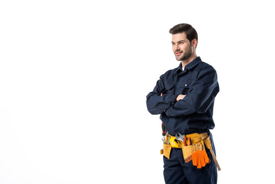 Side View Of Plumber In Uniform With Arms Crossed Isolated On White