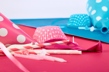 Party pink and blue paper hat.