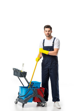 Cleaner In Uniform And Rubber Gloves With Cart Isolated On White