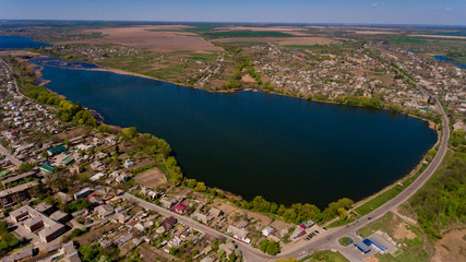 Fototapeta na wymiar Aerial view of the city lake.