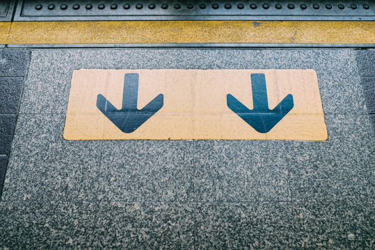 Down arrow signal ,beware Passengers leaving the train