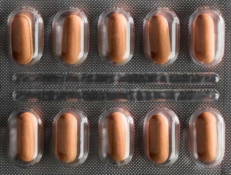 Top view of blister pack with capsules.