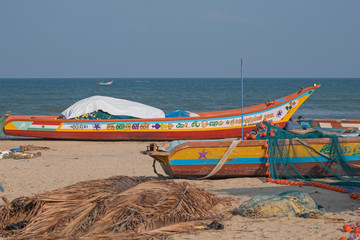 Part of the local fishing fleet stranded on the beach at Mamallapuram in Tamil Nadu. The main catches taken in the Bay of Bengal inshore fishery are pomfrets and prawns