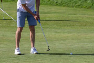 Fototapeta premium A golf player on a green