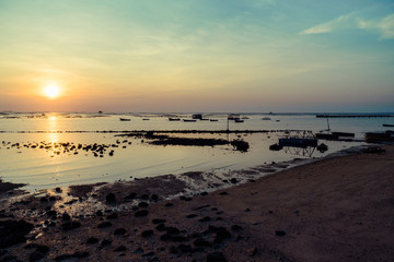 Beautiful Sunset Sunrise Sky over tropical sea landscape, vintage filter.
