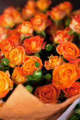 A large bouquet of beautiful orange roses. Wedding. Birthday. Celebration. Give flowers
