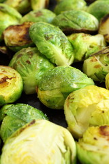 pan-fried brussels sprouts in an iron pan closeup