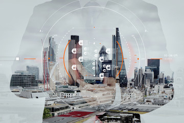Double exposure of success businessman using smart phone and social media diagram with london city...
