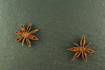 star anise on a slate plate with copy space