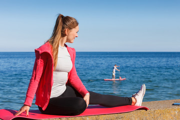 Woman resting relaxing after doing sports outdoors