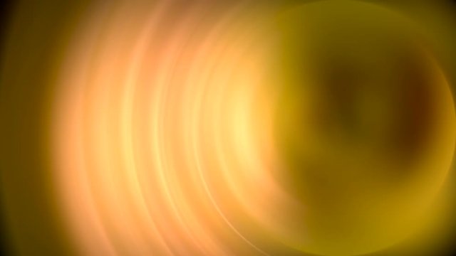 video en fondo amarillo  y dorado con espirales y movimiento redondo de c&iacute;rculos en marr&oacute;n y blanco girando alrededor del fondo