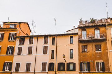 Fototapeta na wymiar old orange buildings in Rome, Italy
