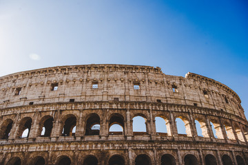 Fototapeta na wymiar bottom view of antique Colosseum ruins in Rome, Italy