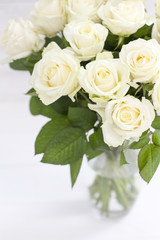Obraz na płótnie Canvas Bouquet of white roses in a vase. Bouquet of chic white roses