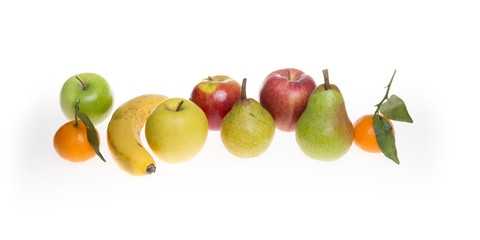 autumn fruits and winters on a white background with clementine banana and mandarin pear apples