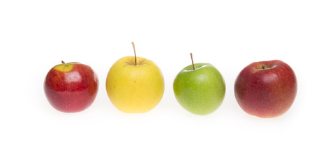apples of different varieties and color in white background