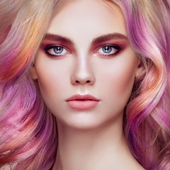 Beauty Fashion Model Girl with Colorful Dyed Hair. Girl with perfect Makeup and Hairstyle. Model with perfect Healthy Dyed Hair. Rainbow Hairstyles