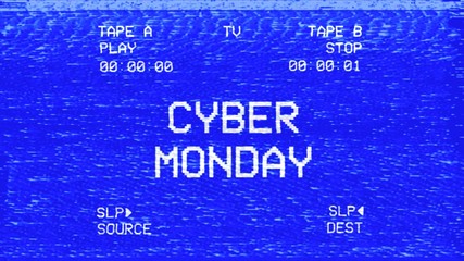 An old damaged VHS tape tracking a bad signal coming from a double deck, with the text Cyber Monday.
