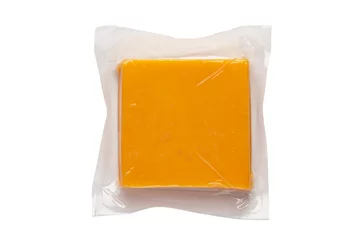 Foto auf Acrylglas cheese in plastic packaging © pbnew