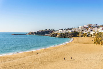 Amazingly wide, almost empty Fishermen Beach in Albufeira, Algarve, Portugal