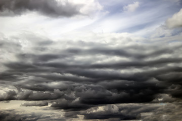 rain clouds on blue sky