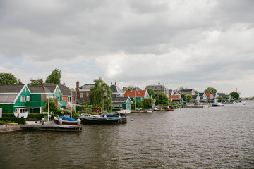 Fototapeta na wymiar View of the houses and the river. Netherlands