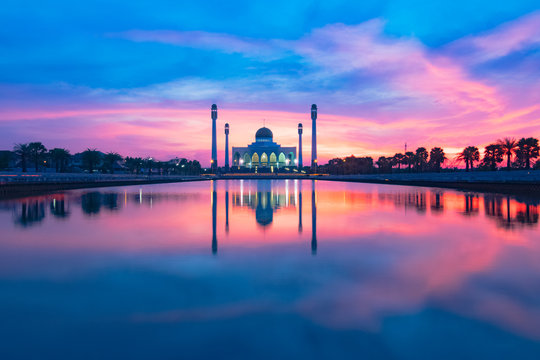 beautiful reflection mosque building shot during sunset or sunrise 