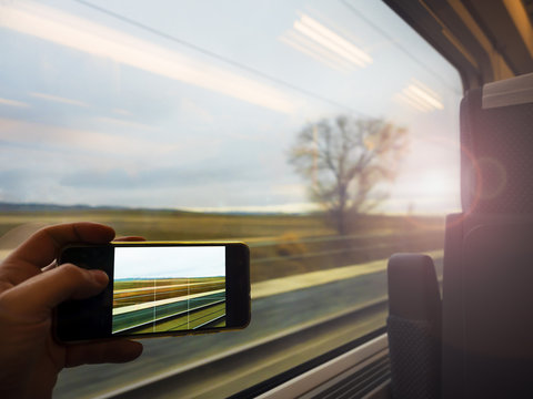 Shooting Sunset Through The Window Of The Train