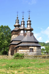 Fototapeta na wymiar Ancient greek catholic wooden church in Szczawnik near Muszyna, Poland