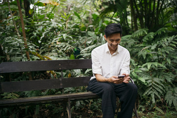 Thai man with smartphone