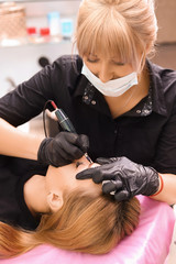 Fototapeta premium Permanent make up on eyebrows.