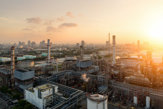 Aerial view of twilight of oil refinery ,Shot from drone of Oil refinery and Petrochemical plant at dusk , Bangkok, Thailand