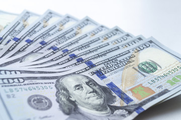 Dollars, closeup photo of one hundred dollar banknotes