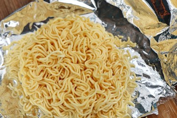 dried instant noodles on wooden