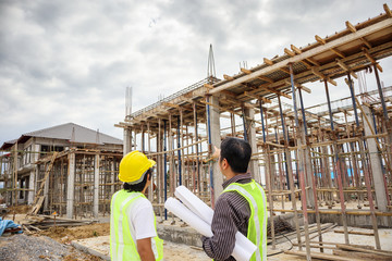 Asian business man construction engineer workers at house building site