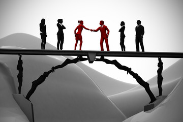 Human bridge merging teams. A bridge made of people helps in the merging of two teams with a handshake.