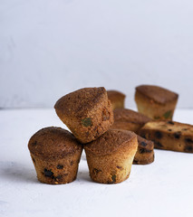 small round baked cupcakes with dry fruits