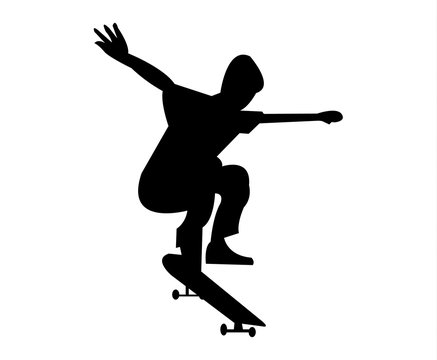 Young boy on a skateboard jumping