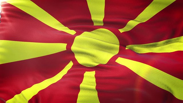 Flag of Macedonia waving on sun. Seamless loop with highly detailed fabric texture. Loop ready in 4k resolution.