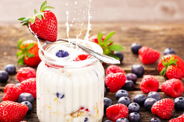 Yogurt with berries and cereals - healthy breakfast