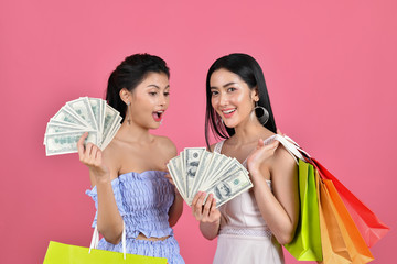 shopping concepts. Beautiful girls shopping in department stores. Beautiful girl happy to shop. Asian girls Exciting time to buy. (Online Business Ideas)