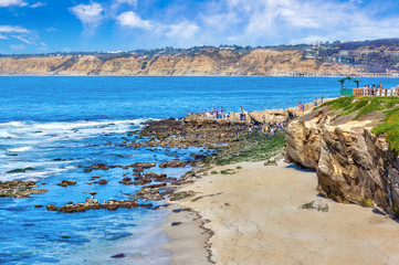 La Jolla Cove beach in San Diego, Southern California, where tourists watch the sea lions on the rock.